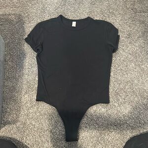 Victoria’s Secret Bodysuit tee. Size medium brand new!